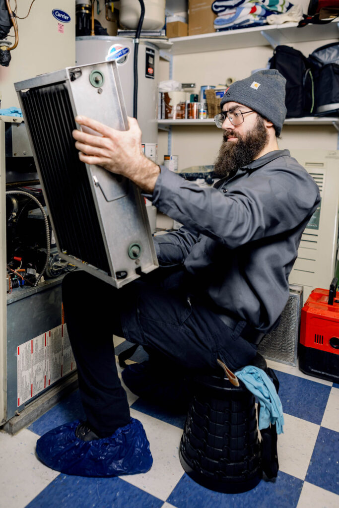 Employee Dustin working Heating maintenance